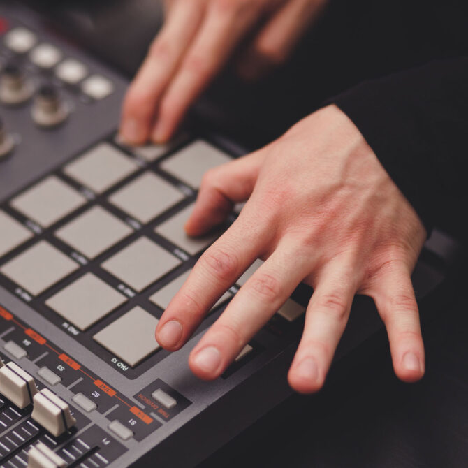 man in the studio creates electronic music